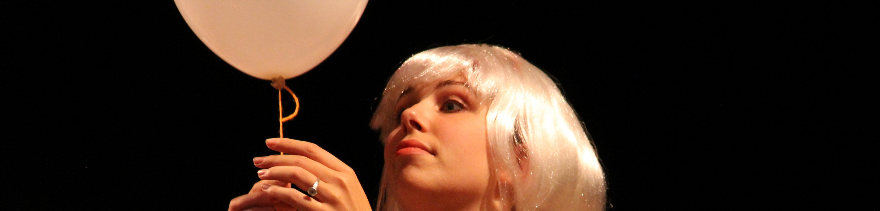 Student performs with a balloon